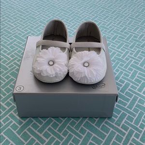 Stuart Weitzman White Baby Shoes with Floral Accent